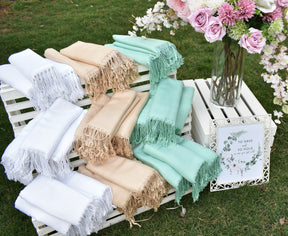 bulk pashmina scarf wedding favor on white crate display